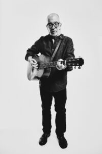 James Keelaghan photo standing with guitar